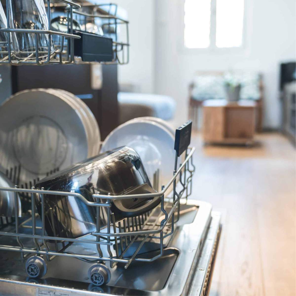 Open dishwasher with clean dishes